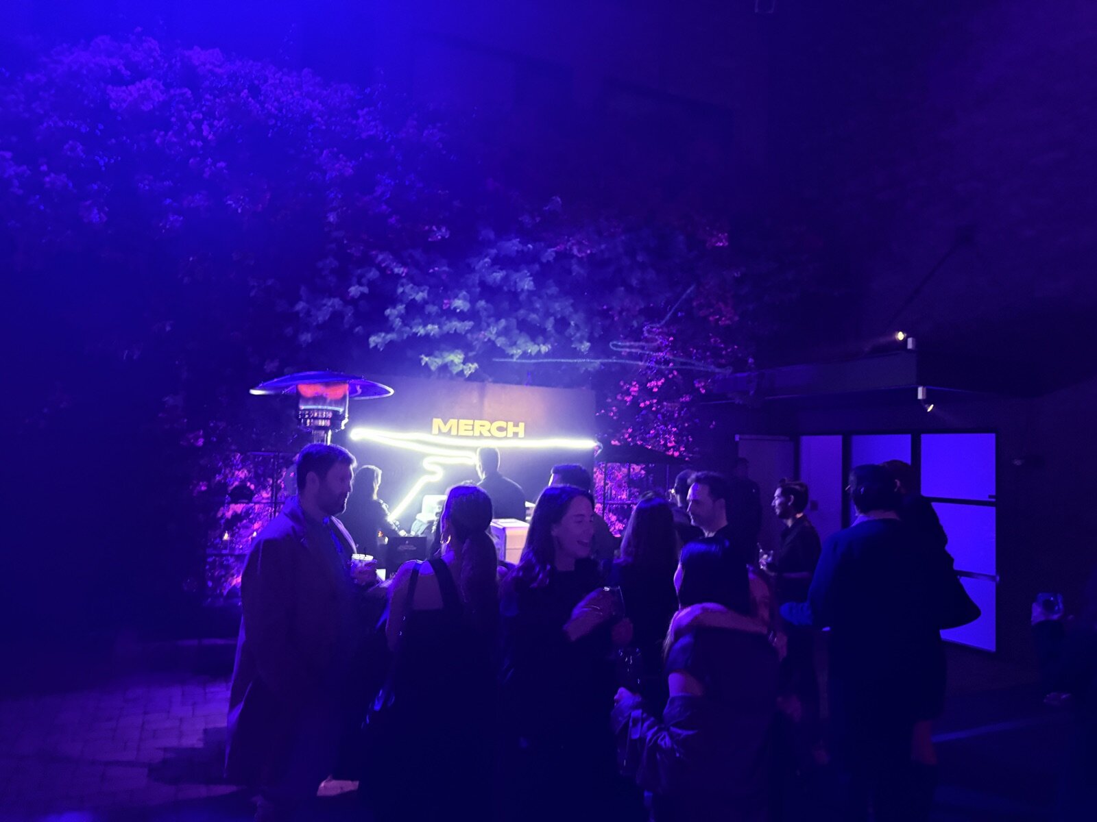 Wide view of a staffed brand activation printing booth