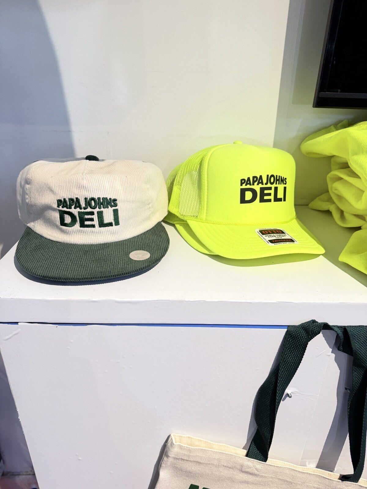 Branded product wall of customized items at an activation